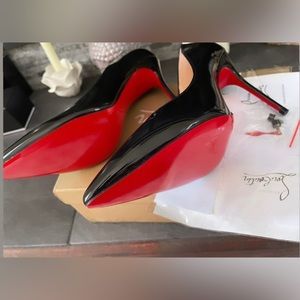 Excellent condition Christian Louboutin patent leather heels.